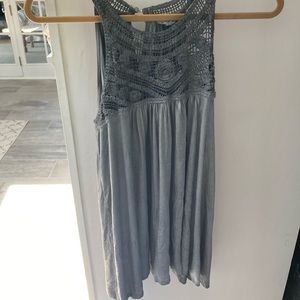 New W/O tags sleeveless crochet accent top.  Perfect to dress up or wear casual.